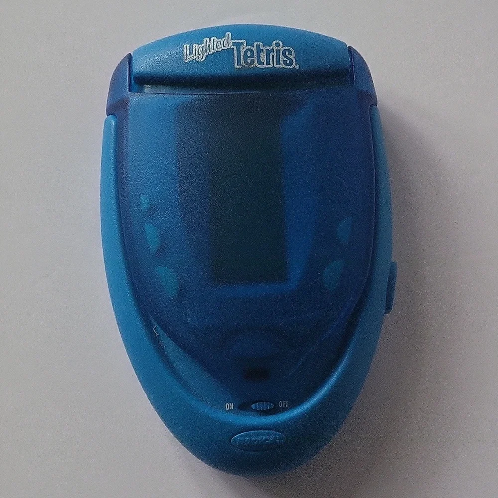 Tetris Lighted Electronic Handheld Travel Game Radica Fliptop Blue 2004 RADICA